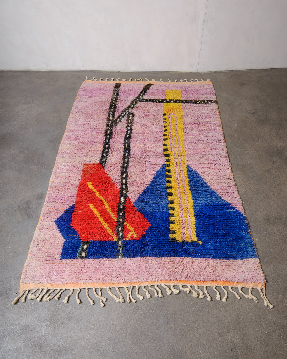 Modern, designer, handcrafted Berber rug from Morocco. Beniourain carpet with beautiful colours and patterns and fluffy wool texture.